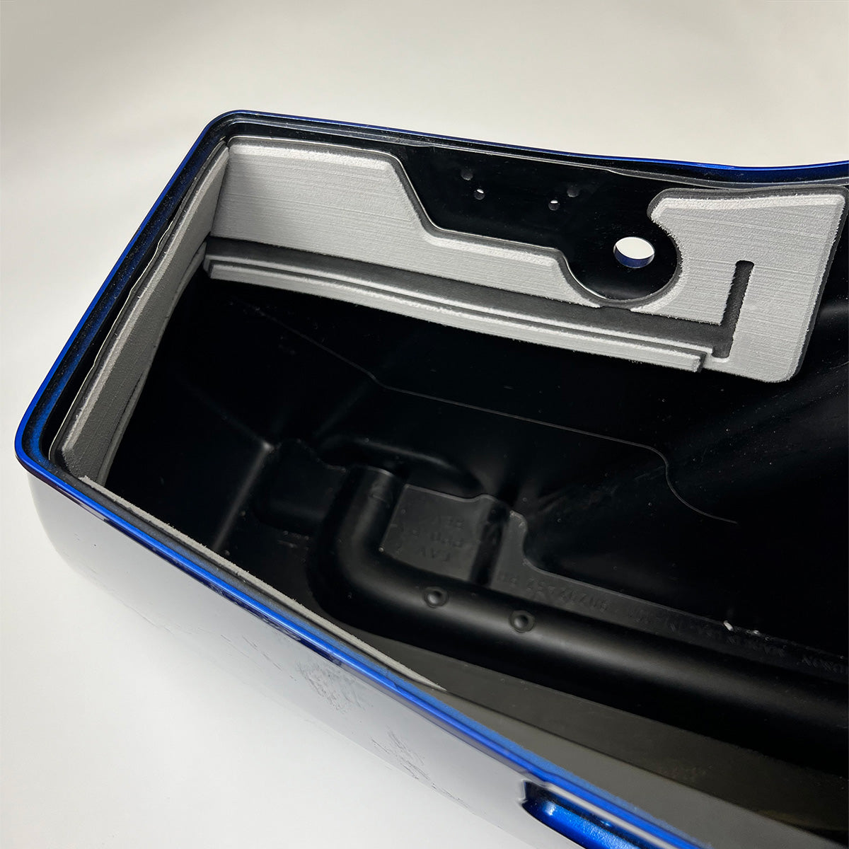 Easy Step 1 to install along the walls of the saddle bag. Self stick foam makes quick and simple