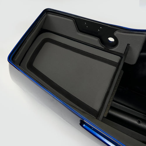 A black and blue motorcycle saddle bag shelf tray kit with a set of keys on it, designed to organize items inside the bag. Charcoal and black version